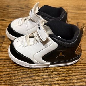 Jordan Kids Sneakers in White, Black, and Gold